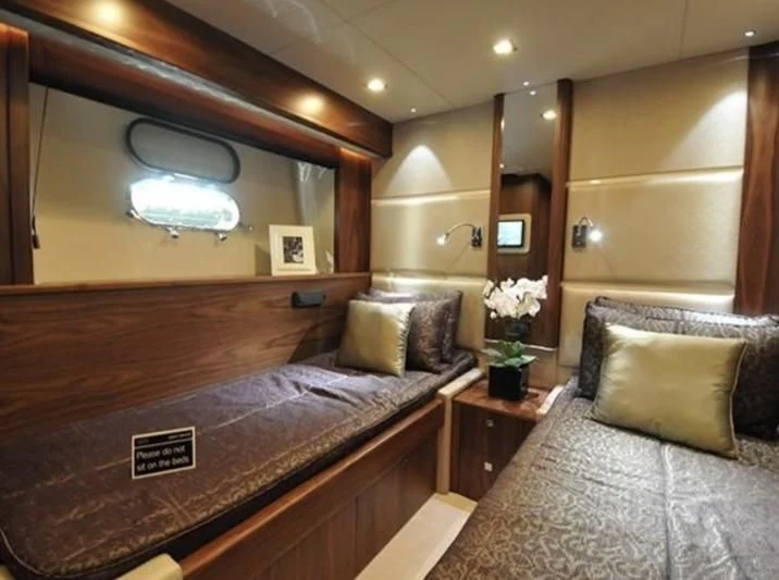 a bed in a hotel room aboard FAMILY SPIRIT Yacht for Sale