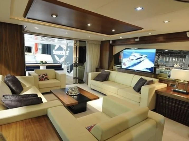 a living room with a large window aboard FAMILY SPIRIT Yacht for Sale
