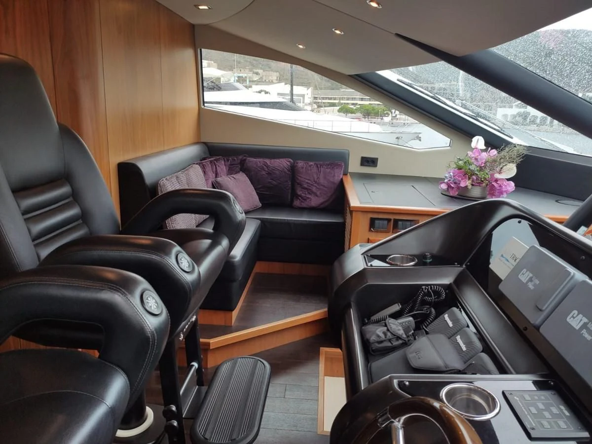 inside of a vehicle with a piano and a flower pot on the dashboard aboard FAMILY SPIRIT Yacht for Sale