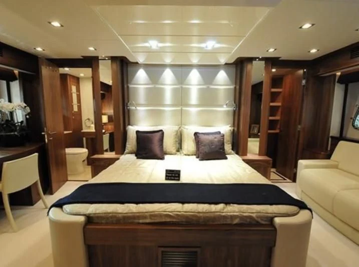 a large bed in a room aboard FAMILY SPIRIT Yacht for Sale