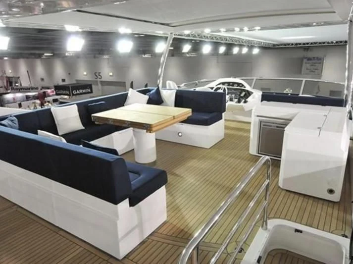 a room with a couch and a table aboard FAMILY SPIRIT Yacht for Sale