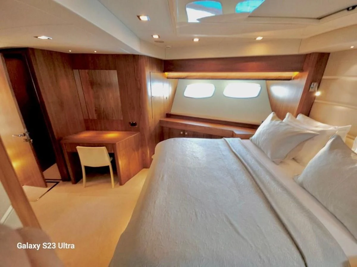 a bed in a room aboard FAMILY SPIRIT Yacht for Sale