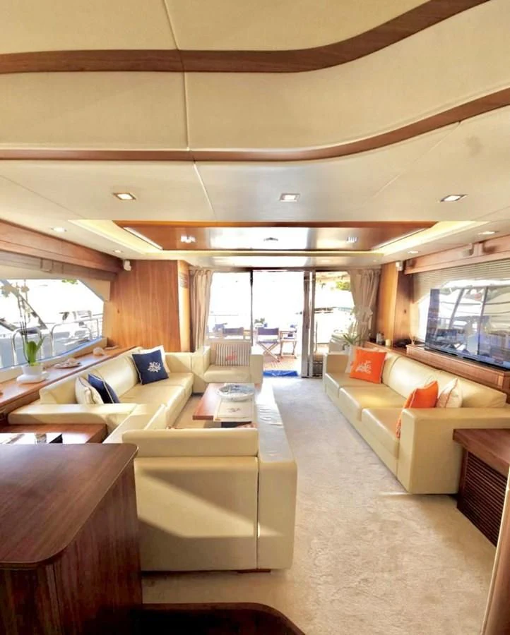 a living room with a large window aboard FAMILY SPIRIT Yacht for Sale