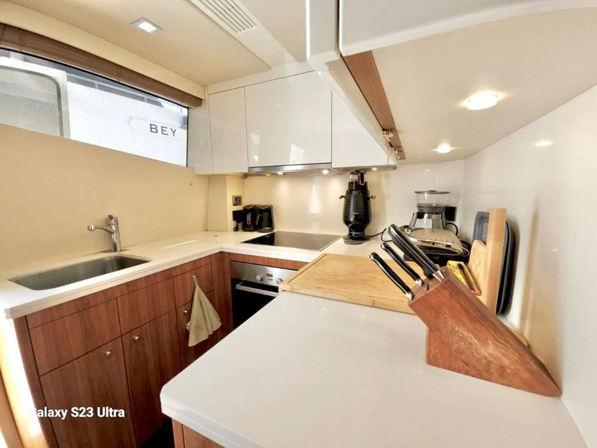 a kitchen with a countertop aboard FAMILY SPIRIT Yacht for Sale