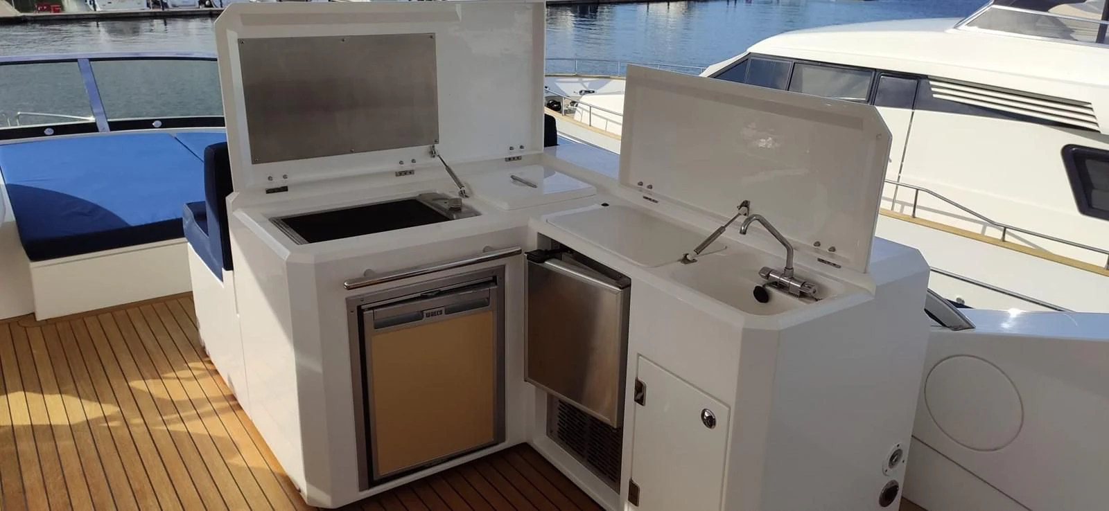 a kitchen with white cabinets aboard FAMILY SPIRIT Yacht for Sale