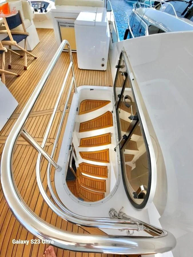 a car with a wheel aboard FAMILY SPIRIT Yacht for Sale