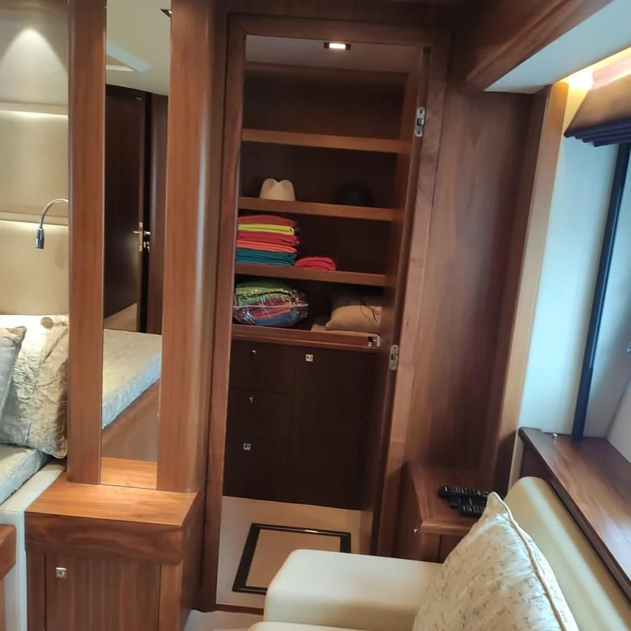 a wood cabinet in a room aboard FAMILY SPIRIT Yacht for Sale