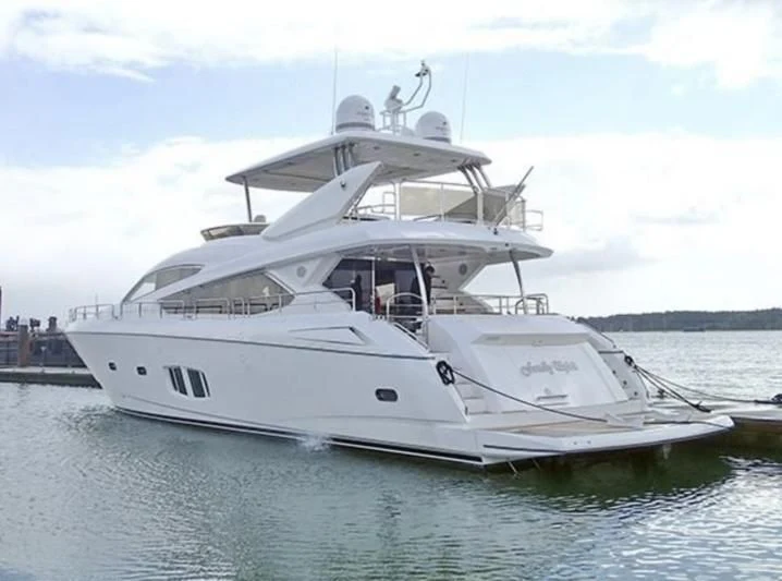a white yacht in the water aboard FAMILY SPIRIT Yacht for Sale