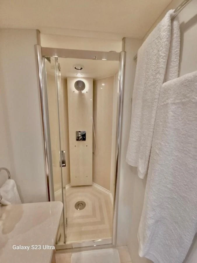 a shower with a glass door aboard FAMILY SPIRIT Yacht for Sale