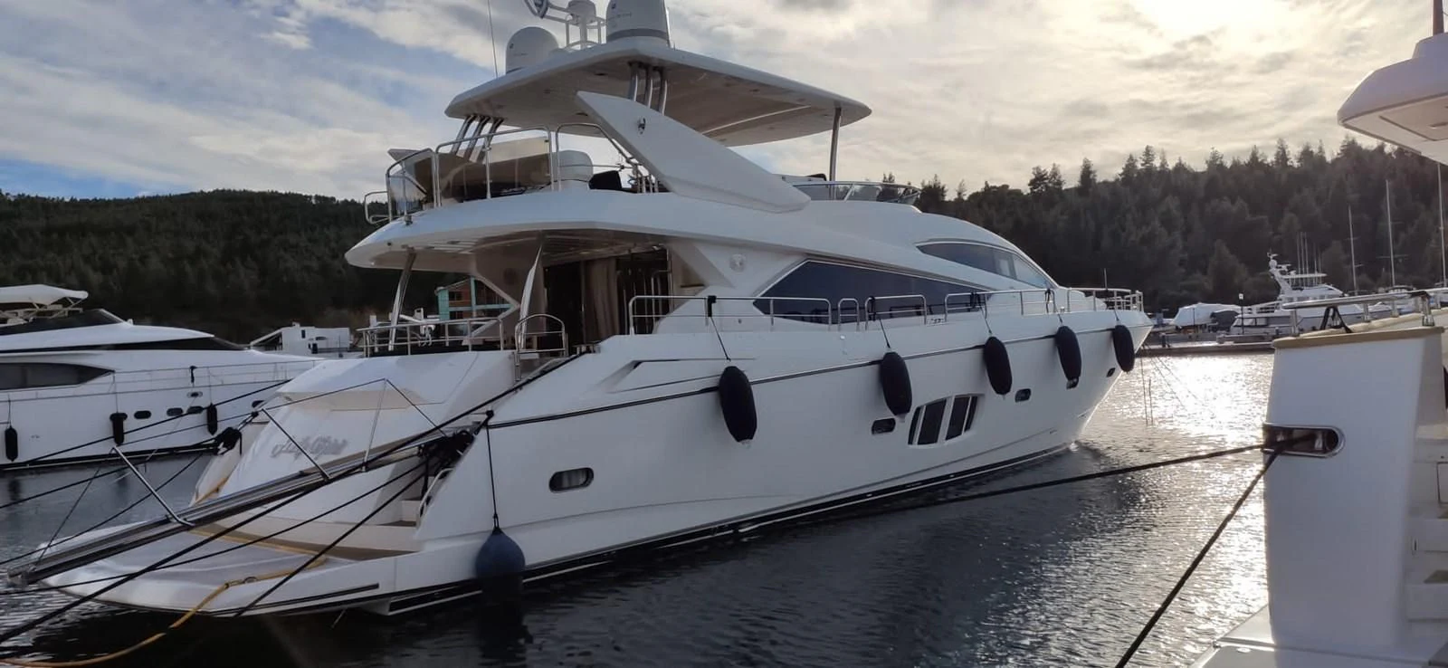 a boat docked at a pier aboard FAMILY SPIRIT Yacht for Sale