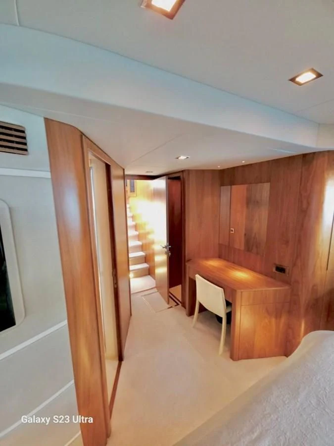 a room with wooden cabinets aboard FAMILY SPIRIT Yacht for Sale