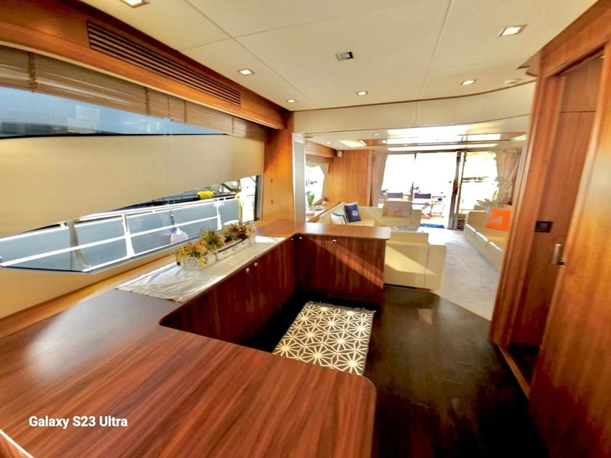 a large kitchen with a large island aboard FAMILY SPIRIT Yacht for Sale