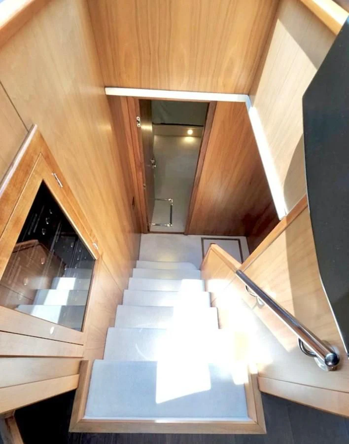 a hallway with a glass door aboard FAMILY SPIRIT Yacht for Sale