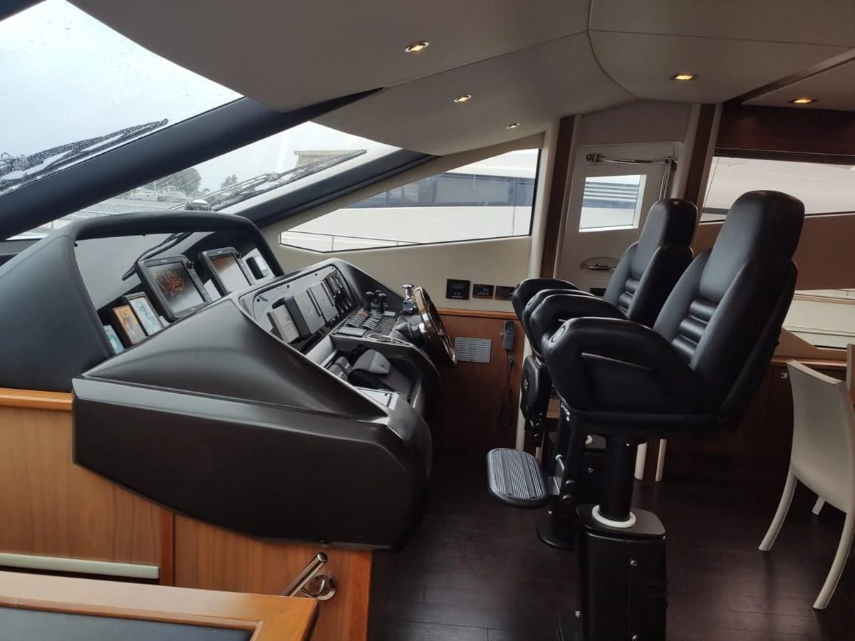 a black and white piano in a car aboard FAMILY SPIRIT Yacht for Sale