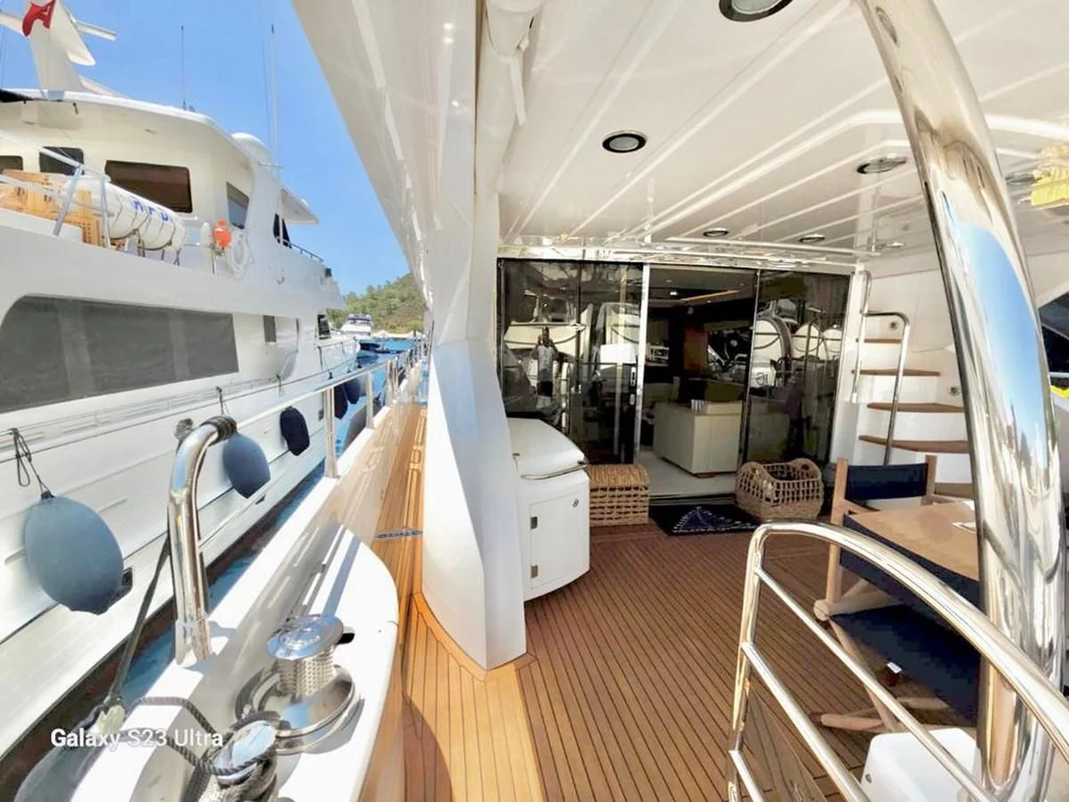 a boat on a deck aboard FAMILY SPIRIT Yacht for Sale