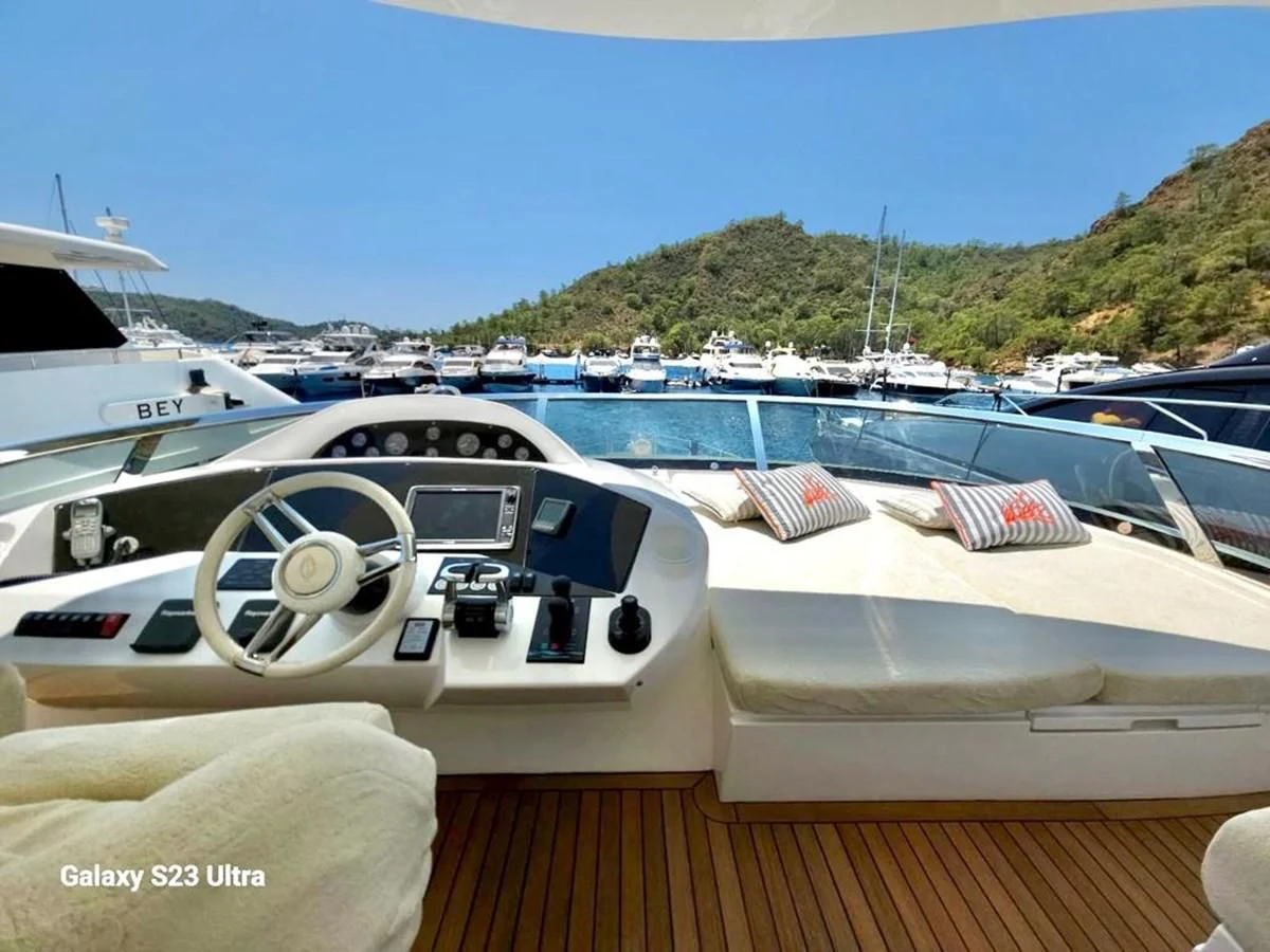 a boat with a large number of boats in the water aboard FAMILY SPIRIT Yacht for Sale