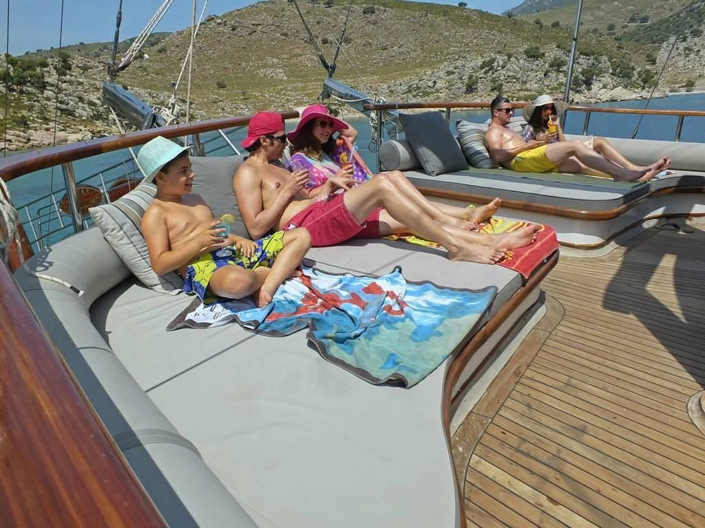 a group of people on a boat aboard KAPTAN MEHMET BUGRA Yacht for Sale
