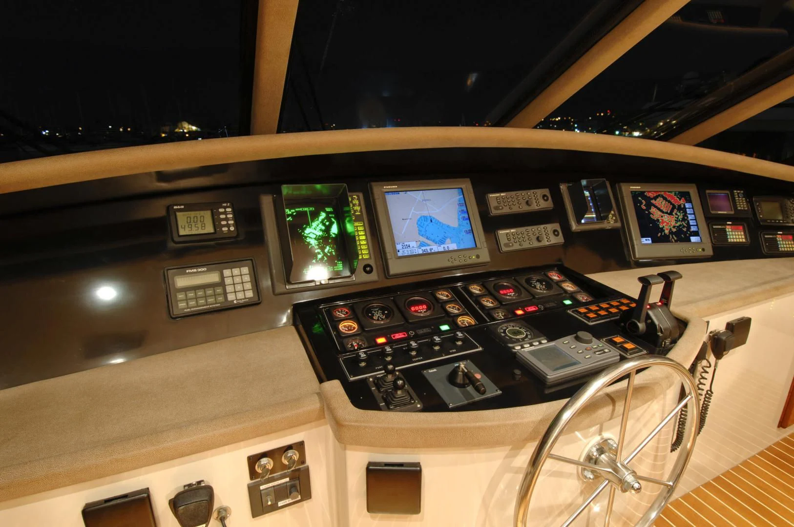 a control panel of a plane aboard MOONSHADOW Yacht for Sale