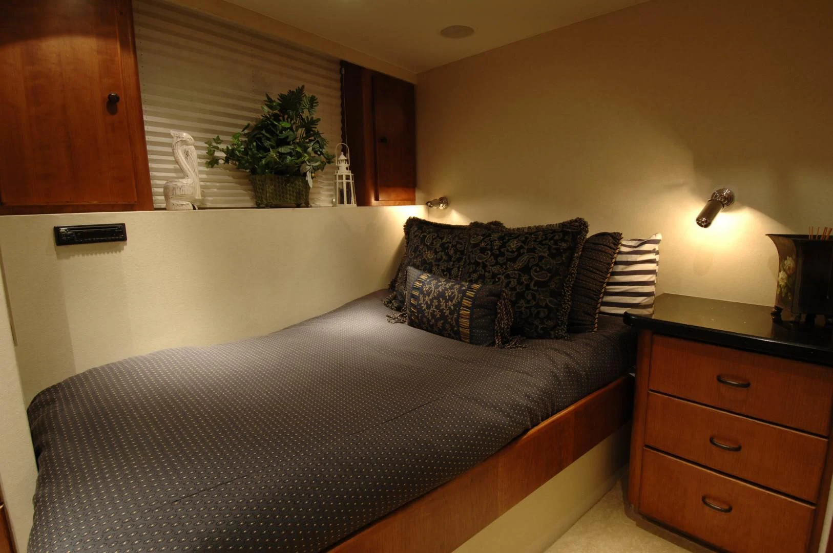 a bed in a room aboard MOONSHADOW Yacht for Sale