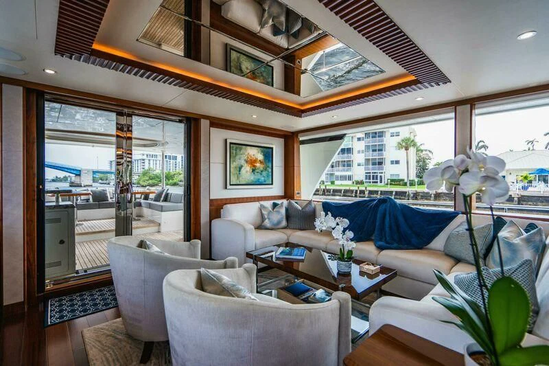 a living room with a large window aboard OA Yacht for Sale