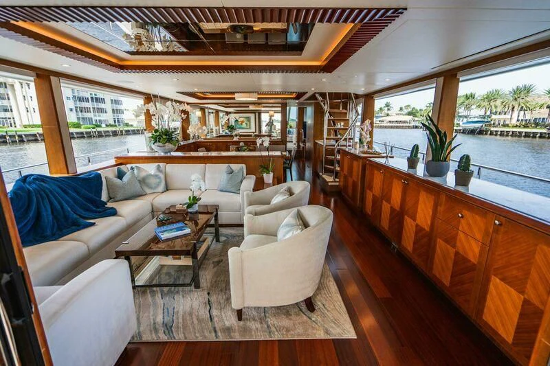 a living room with a large window aboard OA Yacht for Sale