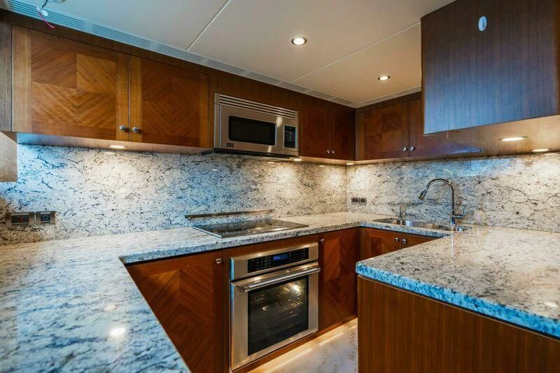 a kitchen with granite counter tops aboard OA Yacht for Sale