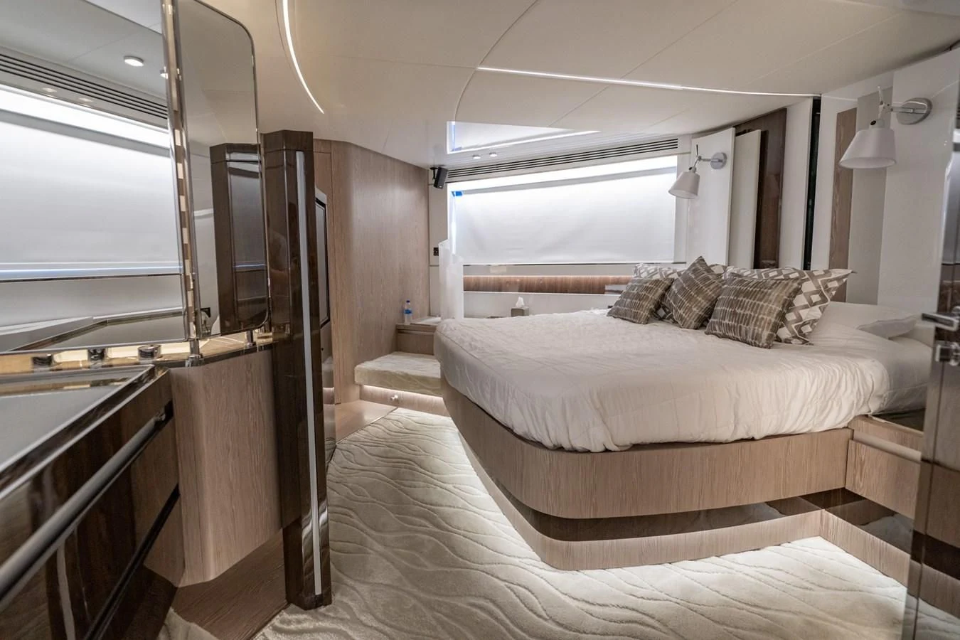 a room with a bed and a window aboard CANDELARIA Yacht for Sale