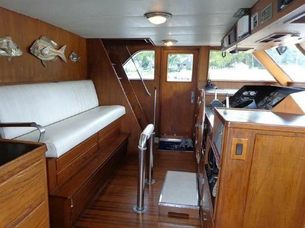a room with a bed and a couch aboard YACHTS A LUCK Yacht for Sale