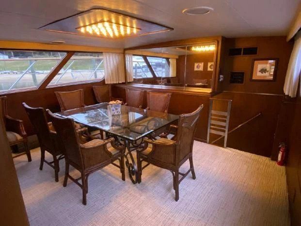 a dining room with a table aboard YACHTS A LUCK Yacht for Sale