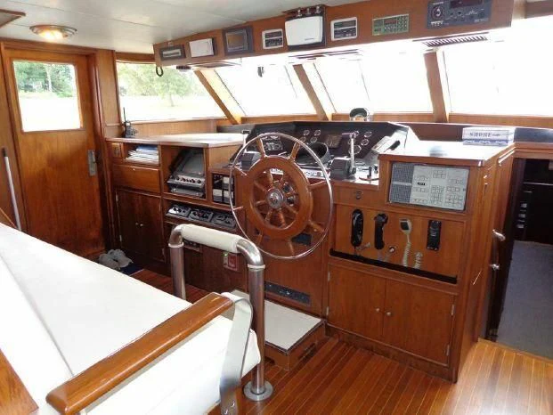 a wooden boat with a fan aboard YACHTS A LUCK Yacht for Sale