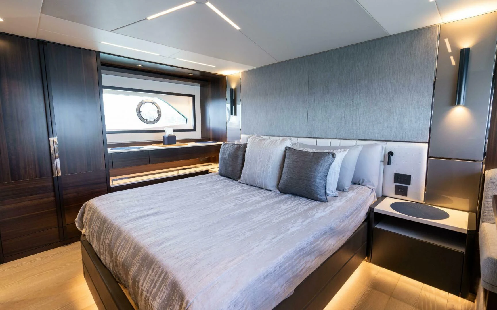 a room with a bed and a desk aboard 4-PLAY VII Yacht for Sale