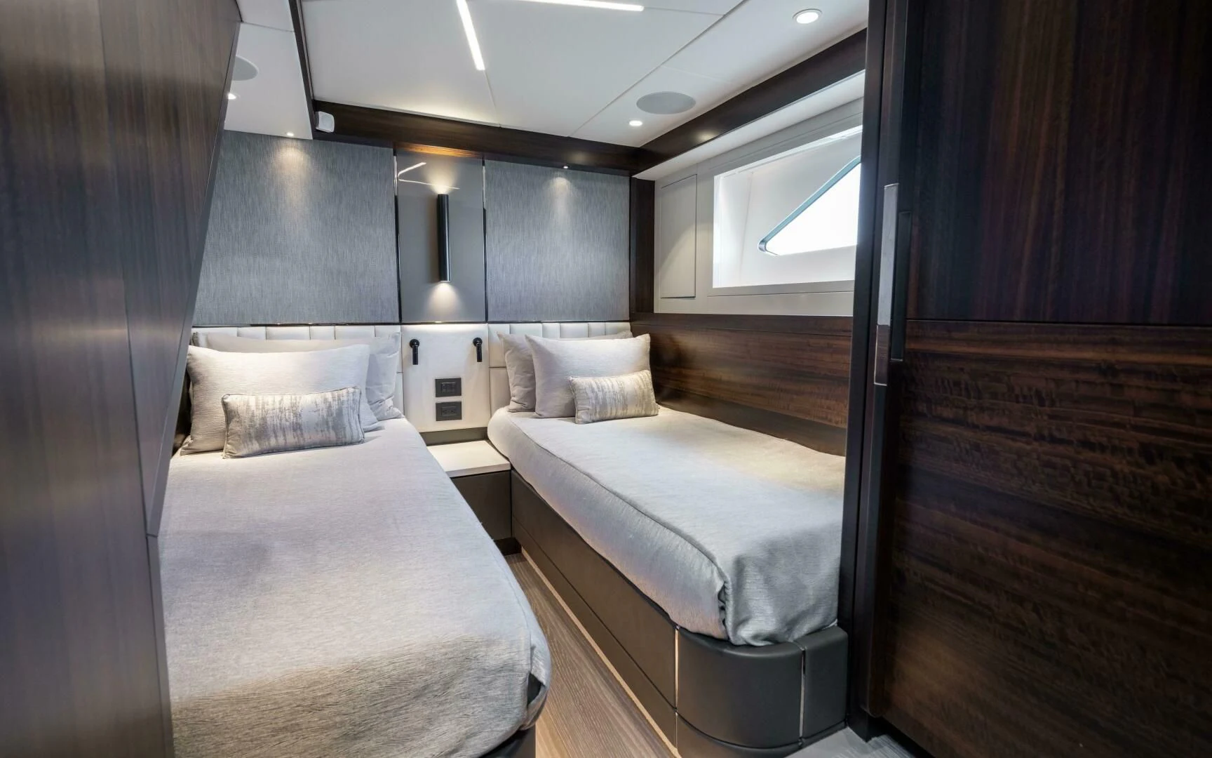 a room with two beds aboard 4-PLAY VII Yacht for Sale