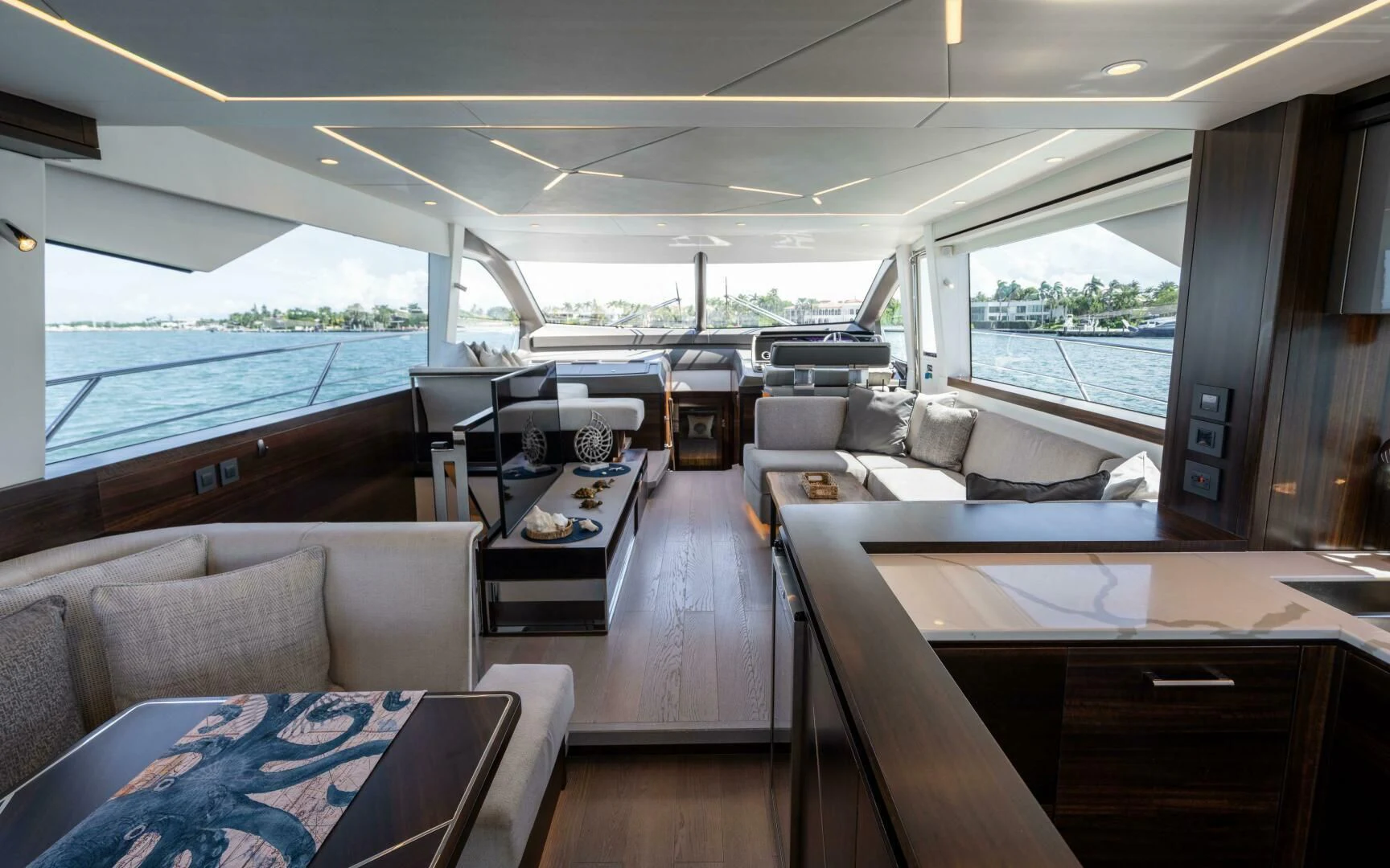 inside of a vehicle with a large window and a view of the water aboard 4-PLAY VII Yacht for Sale