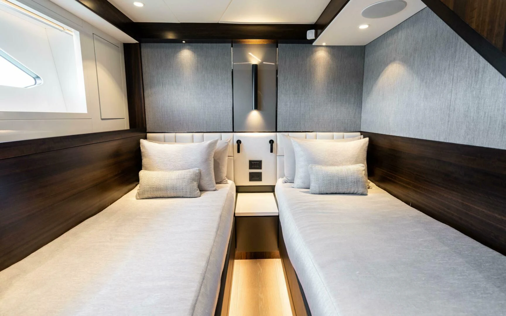 a room with a bed and a large mirror aboard 4-PLAY VII Yacht for Sale