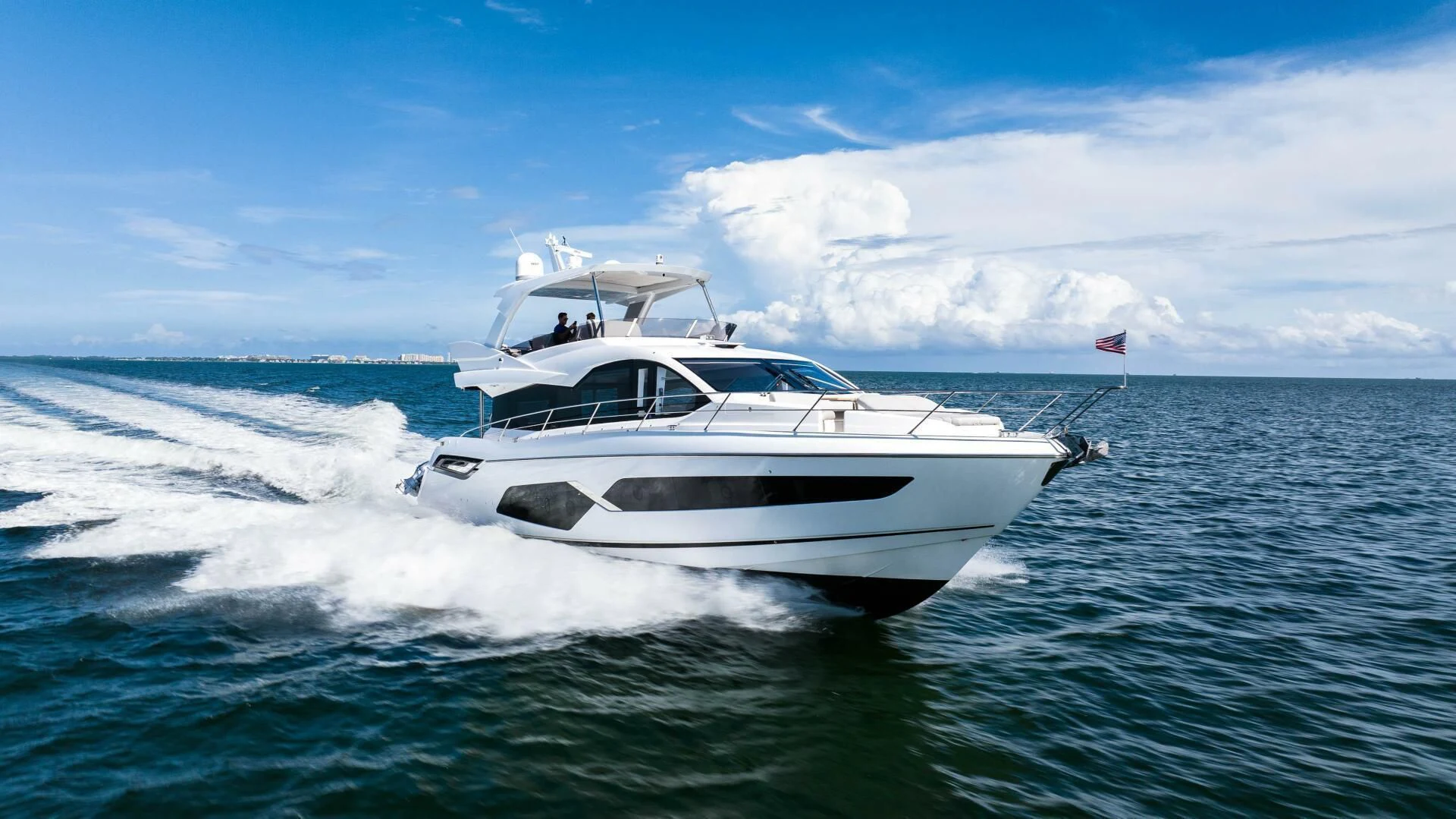 a white yacht on the water aboard 4-PLAY VII Yacht for Sale