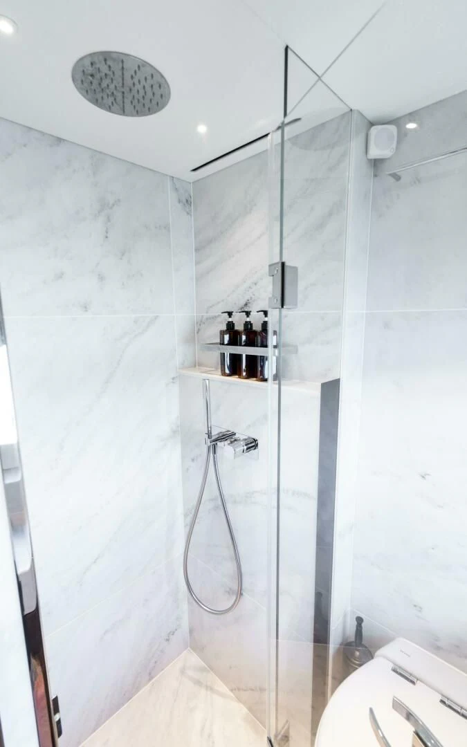 a shower with a glass door aboard 4-PLAY VII Yacht for Sale