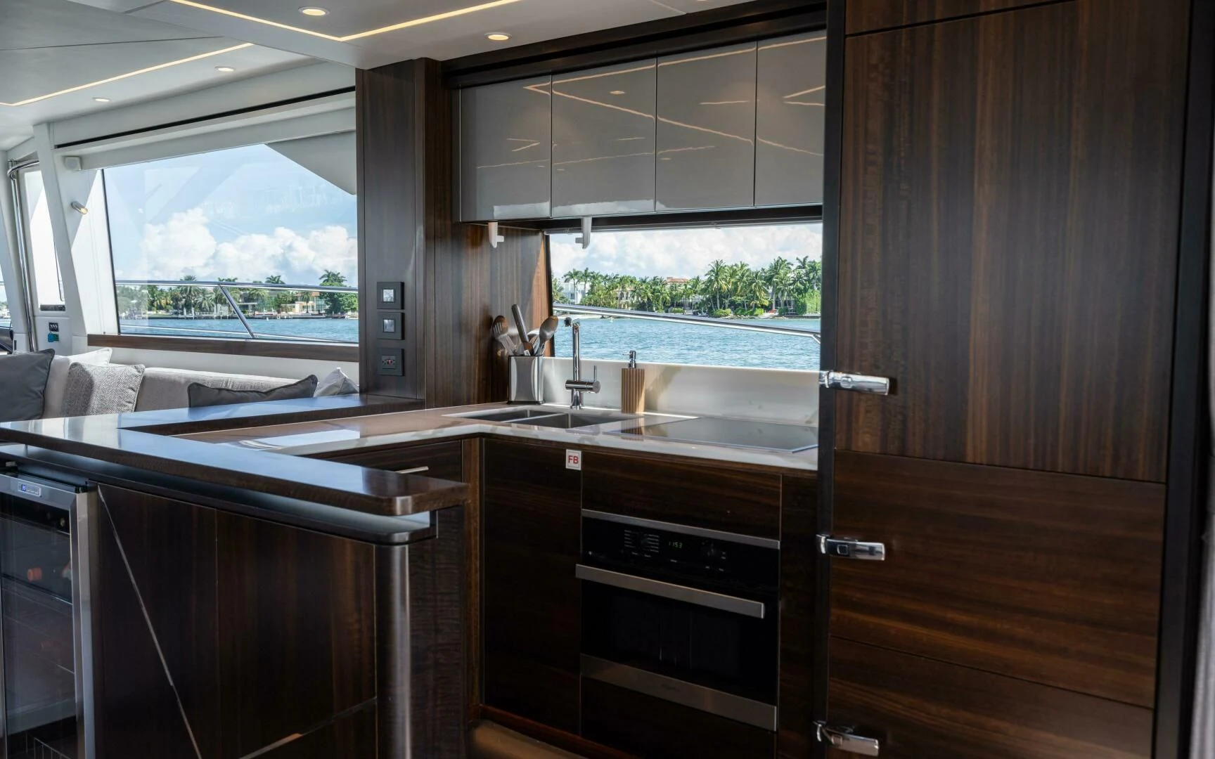a kitchen with a sink and cabinets aboard 4-PLAY VII Yacht for Sale
