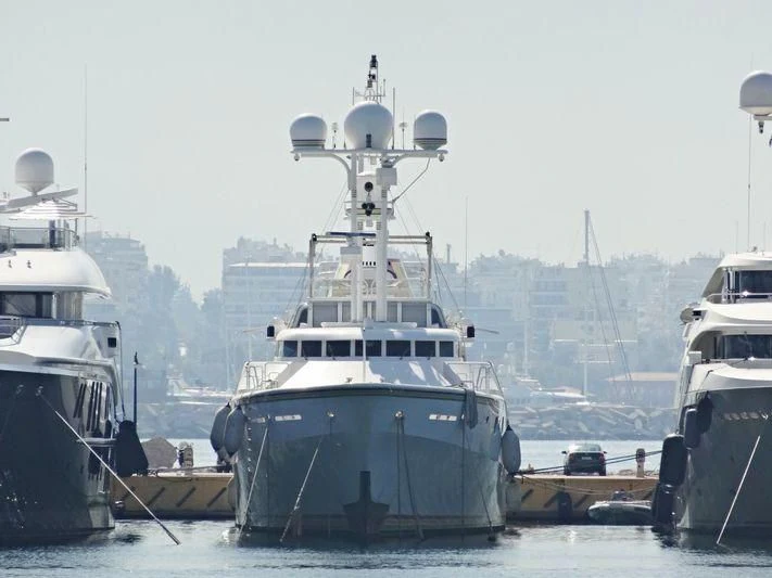 a group of boats are parked in a harbor aboard CEDAR SEA II Yacht for Sale