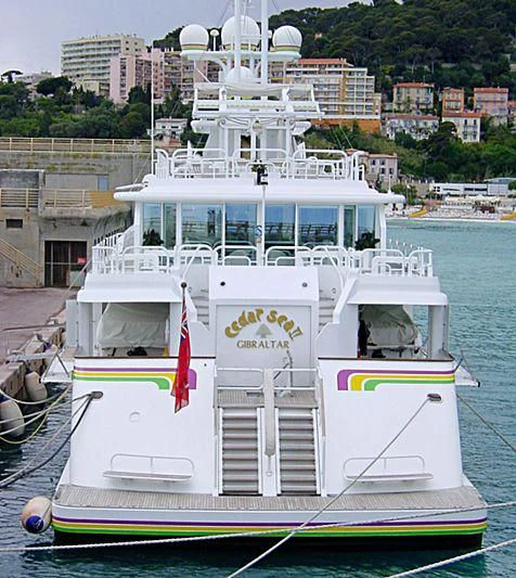 a boat docked at a pier aboard CEDAR SEA II Yacht for Sale