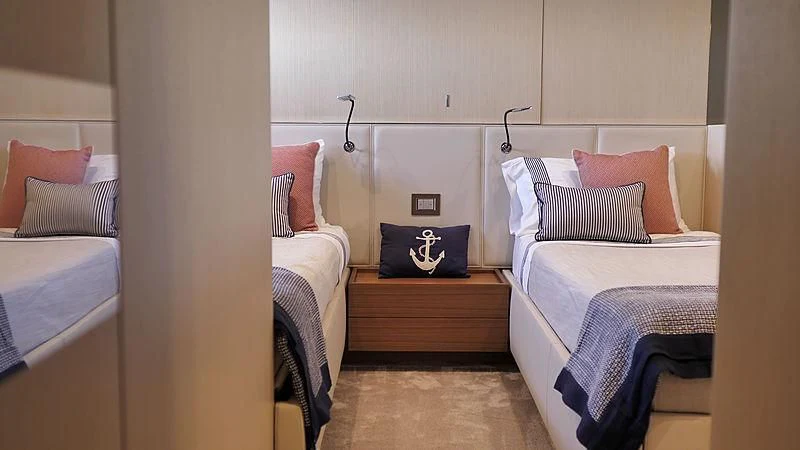 a room with beds and a pillow aboard THIRTY EIGHT Yacht for Sale