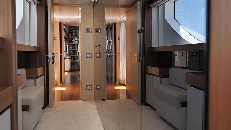 a room with a bed and a tv on the wall aboard THIRTY EIGHT Yacht for Sale