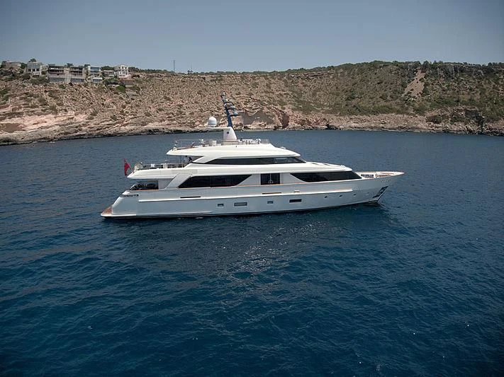 a white boat in the water aboard THIRTY EIGHT Yacht for Sale