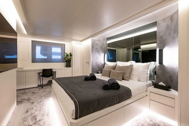 a bed in a room aboard EVA Yacht for Charter