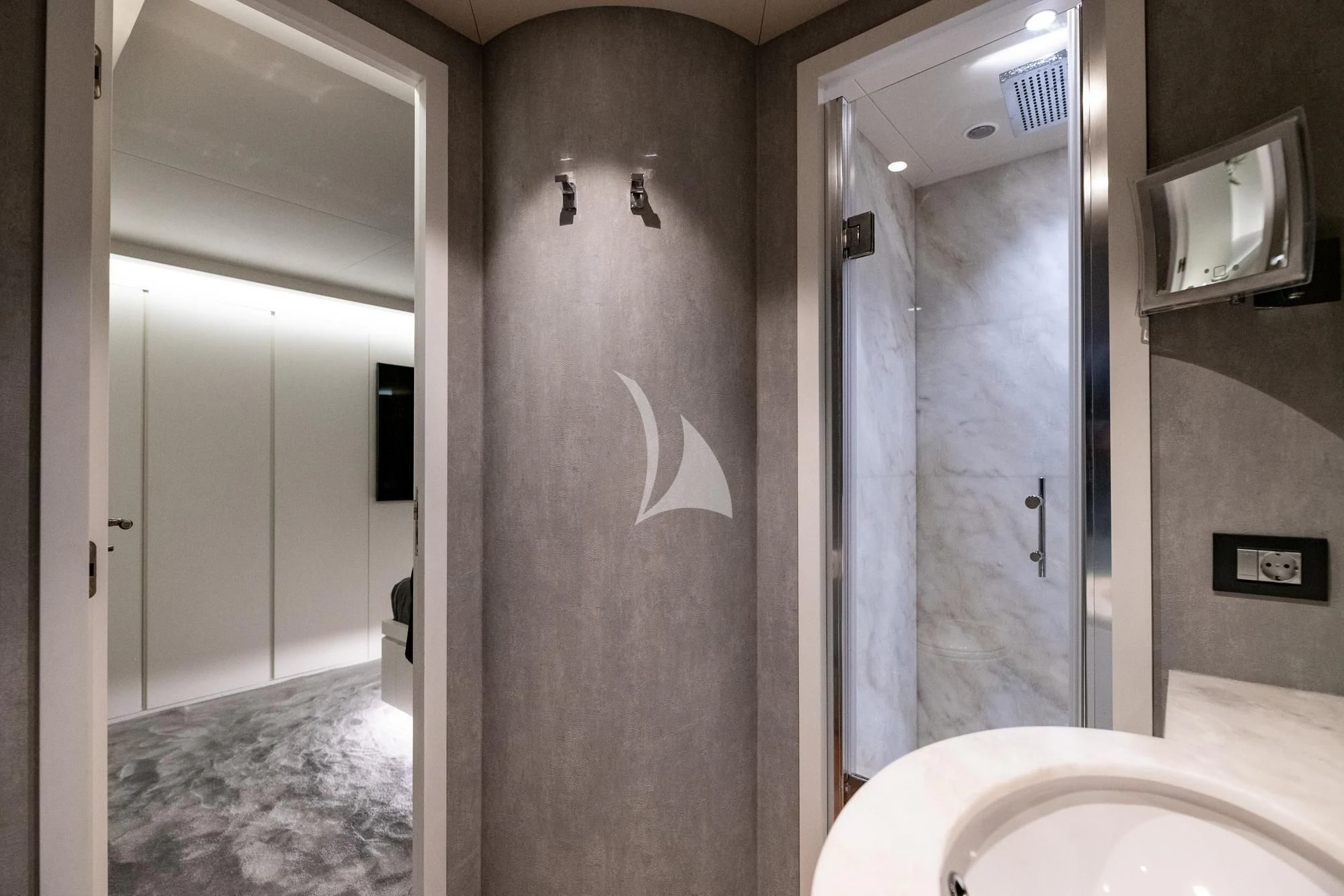 a bathroom with a shower and a sink aboard EVA Yacht for Charter