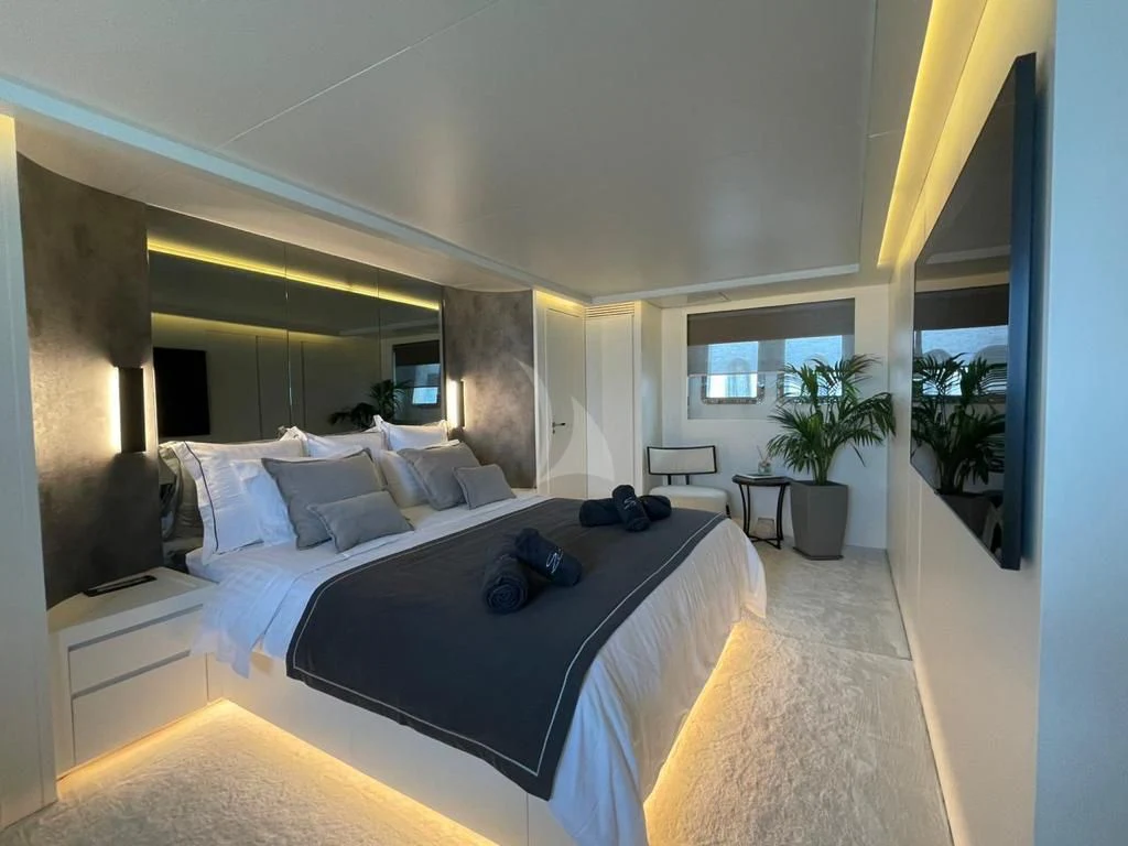 a large bed in a room aboard EVA Yacht for Charter