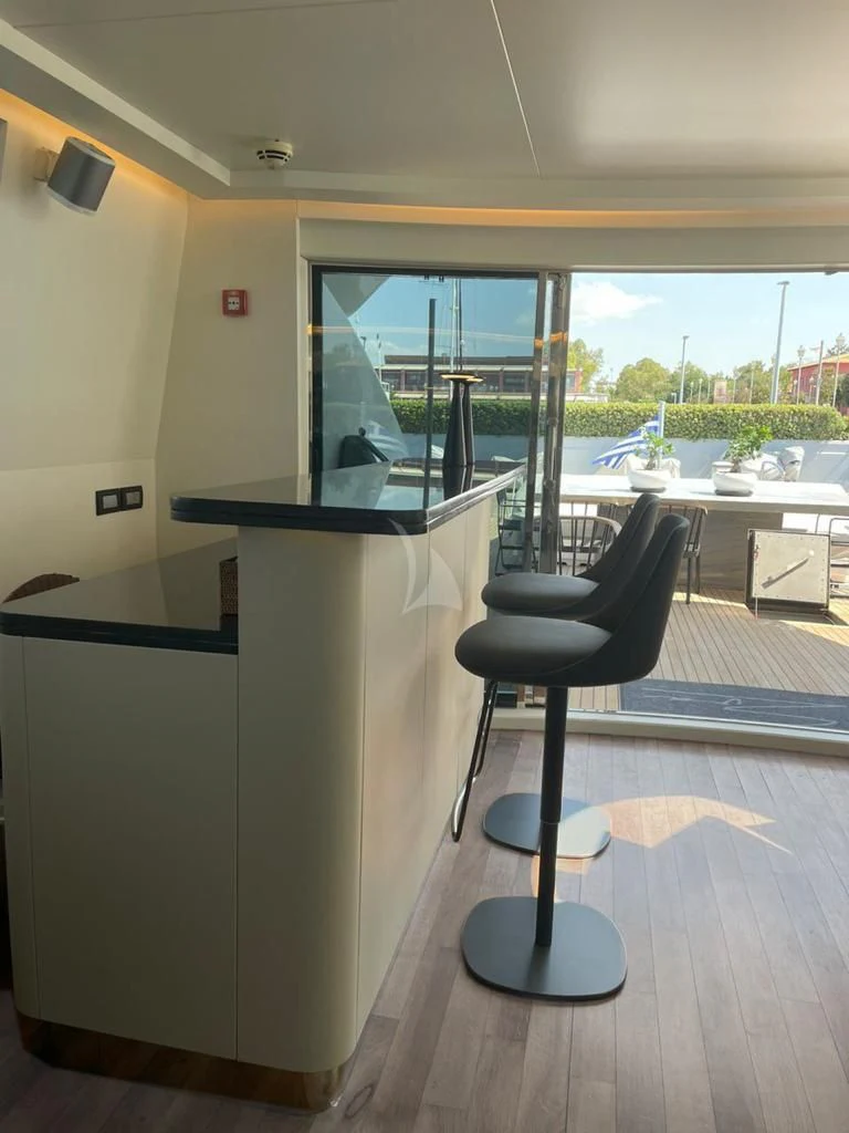 a black chair in a room aboard EVA Yacht for Charter