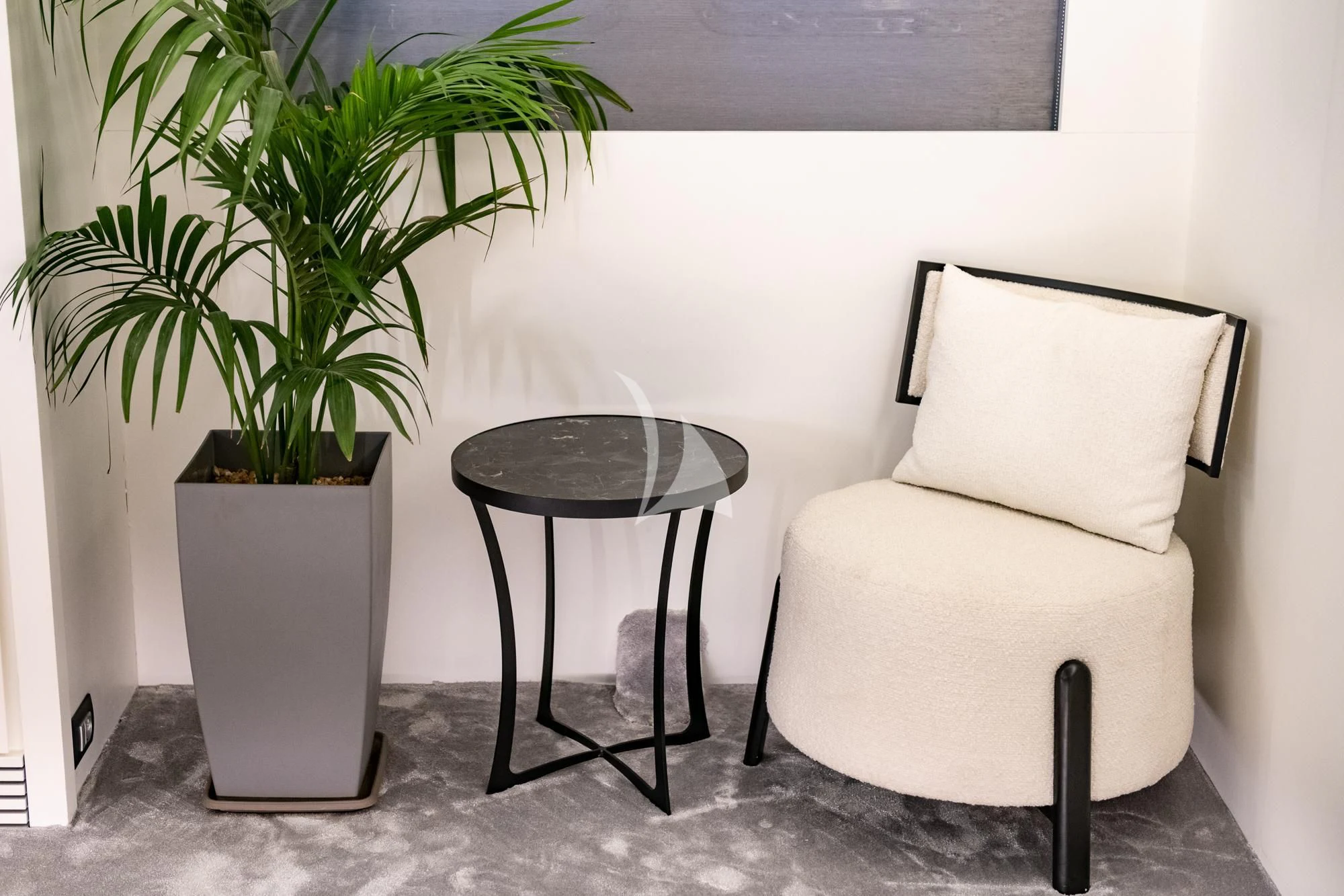 a chair and a table in a room aboard EVA Yacht for Charter