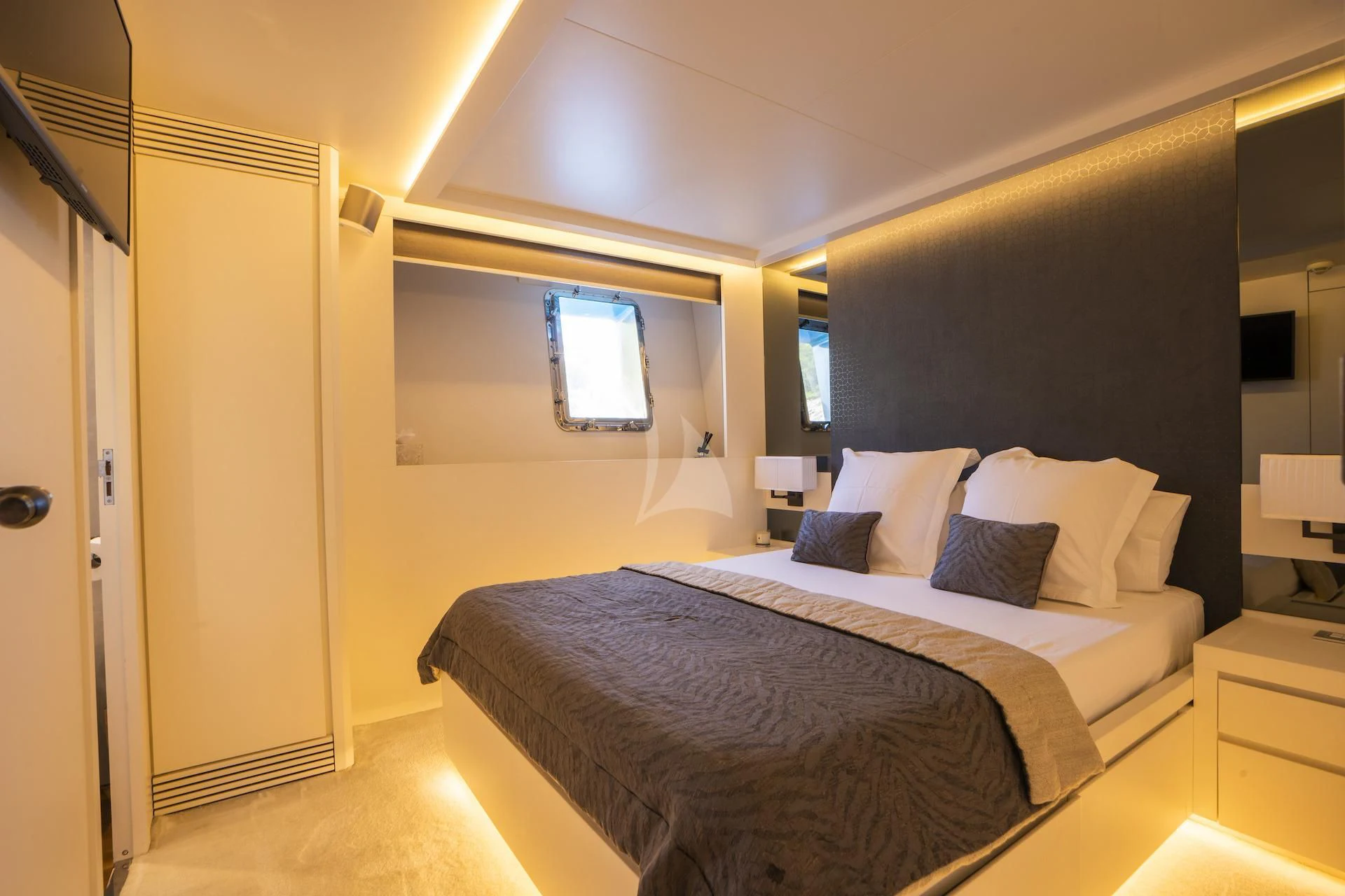a bed in a room aboard EVA Yacht for Charter