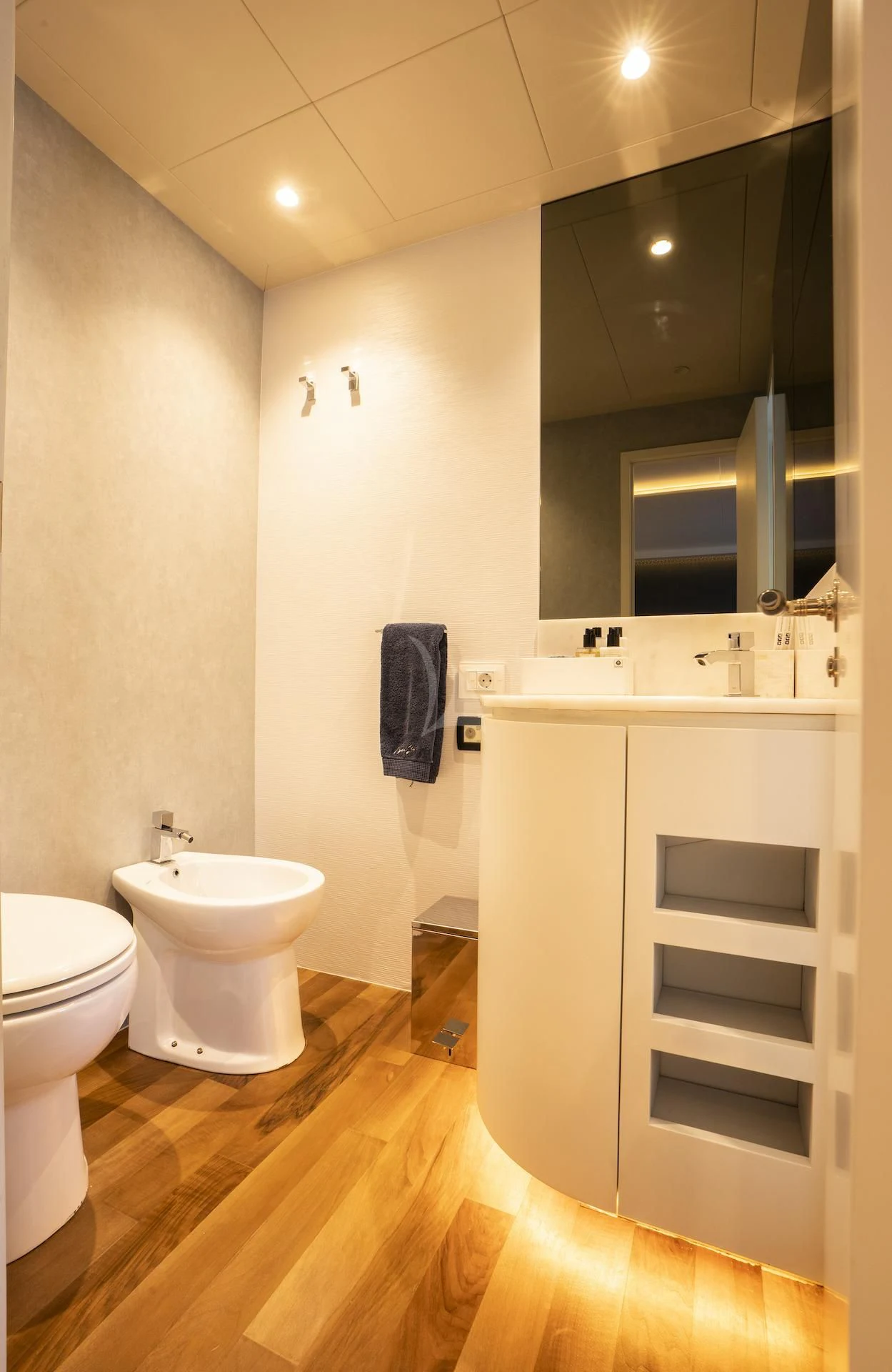 a bathroom with a sink and a toilet aboard EVA Yacht for Charter