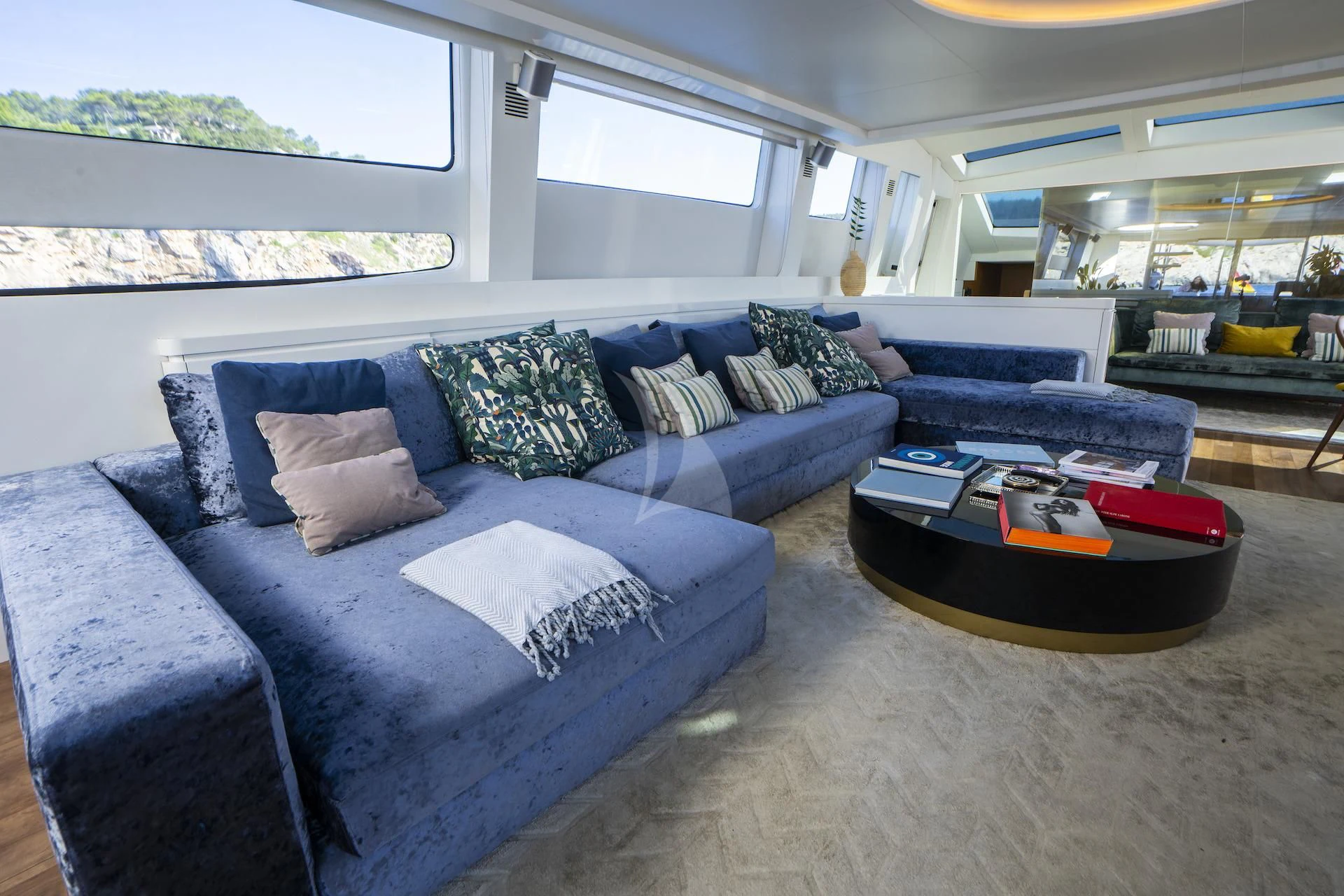 a living room with a couch aboard EVA Yacht for Charter